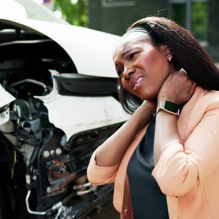 Woman in Car Accident with neck pain